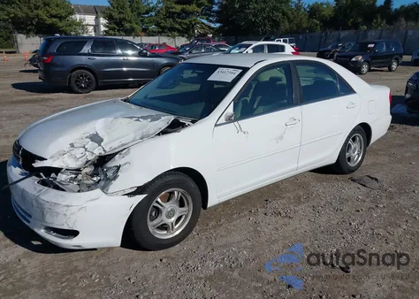 2002 Toyota Camry Le from USA, damaged, VIN 4T1BE32K82U042045